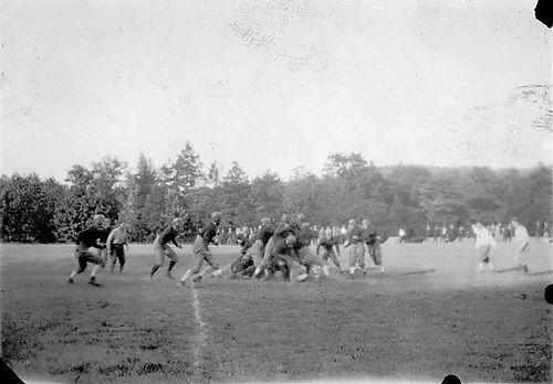 Players in the middle of a scrimmage, (1 of 3)